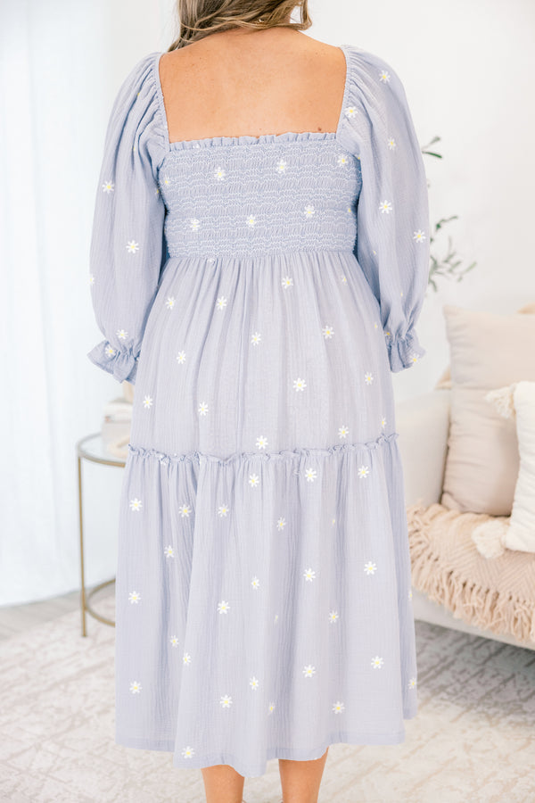 Chic Soul plus size clothing, blue tiered maxi dress with long sleeves that have a ruffle detail at the end of the sleeve and white stitched florals throughout as well as a square neckline
