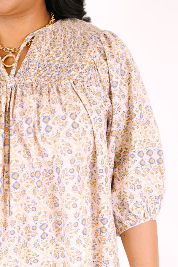 Chic Soul plus size clothing, ivory three quarter sleeve top with a floral pattern and slight v-neckline 