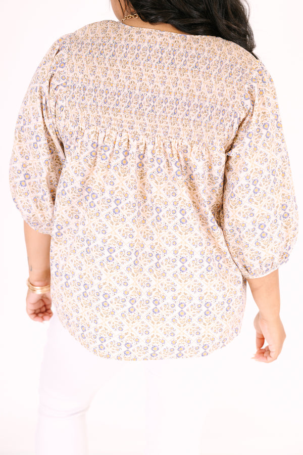 Chic Soul plus size clothing, ivory three quarter sleeve top with a floral pattern and slight v-neckline 