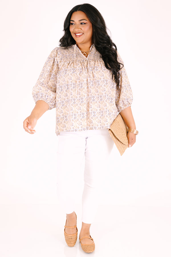 Chic Soul plus size clothing, ivory three quarter sleeve top with a floral pattern and slight v-neckline 