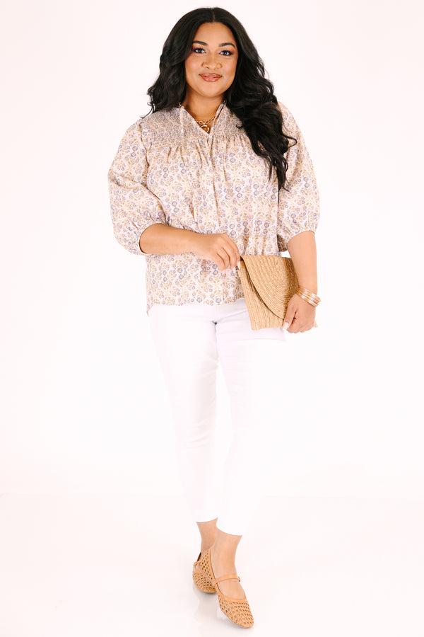 Chic Soul plus size clothing, ivory three quarter sleeve top with a floral pattern and slight v-neckline 