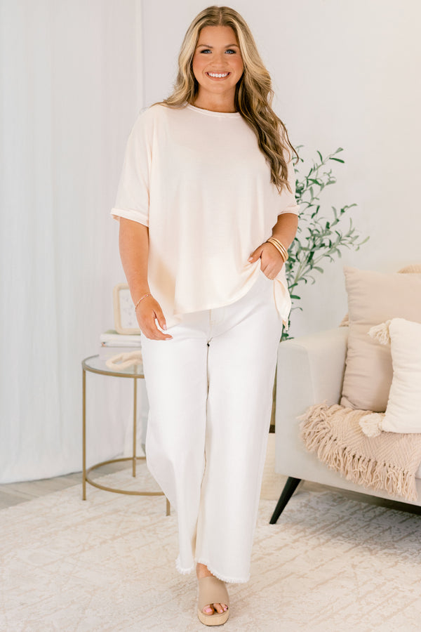 Chic Soul plus size clothing, cream jeans with button and zipper fly and frayed hems at the end of the jean legs