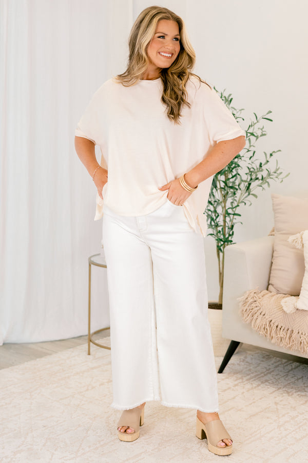 Chic Soul plus size clothing, cream jeans with button and zipper fly and frayed hems at the end of the jean legs