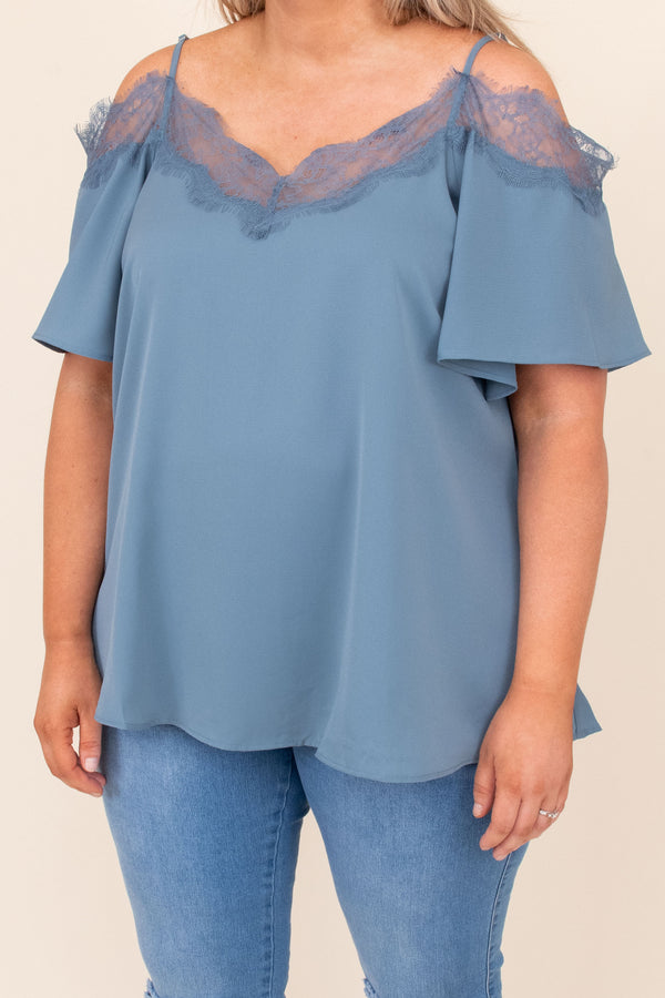Plus Size dusty blue cold-shoulder blouse with lace trim neckline and short flutter sleeves.