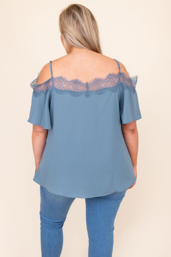 Plus Size dusty blue cold-shoulder blouse with lace trim neckline and short flutter sleeves.