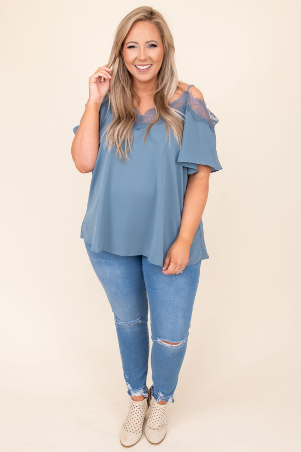 Plus Size dusty blue cold-shoulder blouse with lace trim neckline and short flutter sleeves.