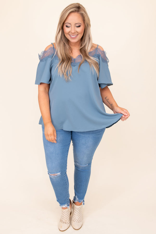 Plus Size dusty blue cold-shoulder blouse with lace trim neckline and short flutter sleeves.