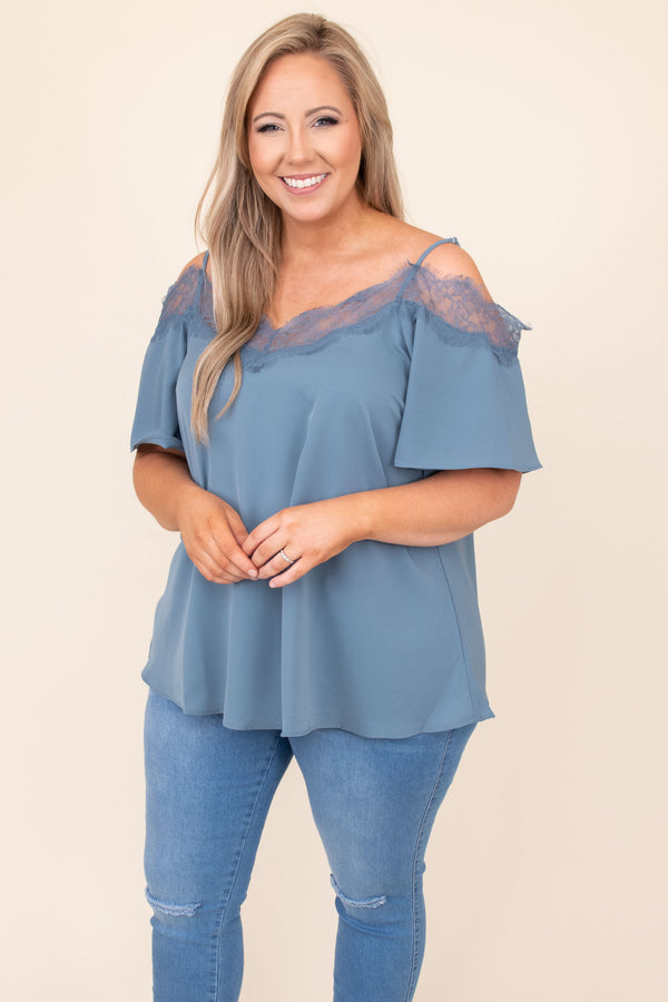 Plus Size dusty blue cold-shoulder blouse with lace trim neckline and short flutter sleeves.