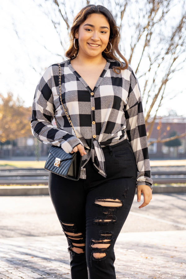 Chic Soul plus size clothing long sleeve top with black and white plaid design. It is button down in the front. 