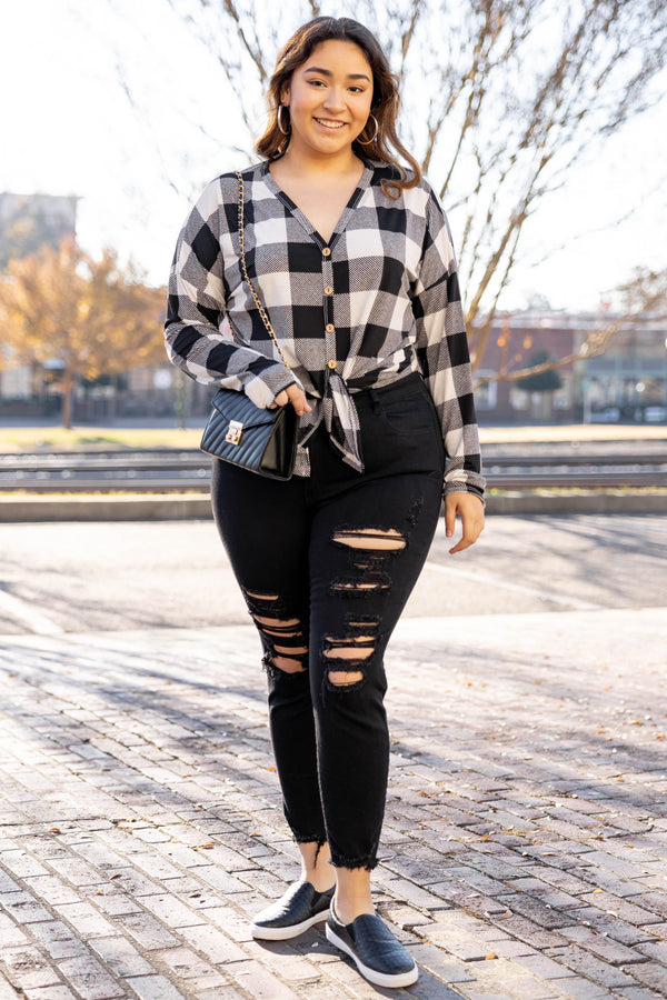 Chic Soul plus size clothing long sleeve top with black and white plaid design. It is button down in the front. 