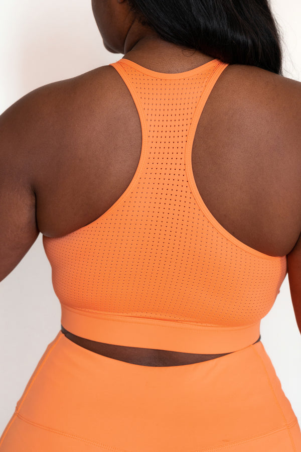 Chic Soul plus size clothing, coral orange sports bra with mesh detailing