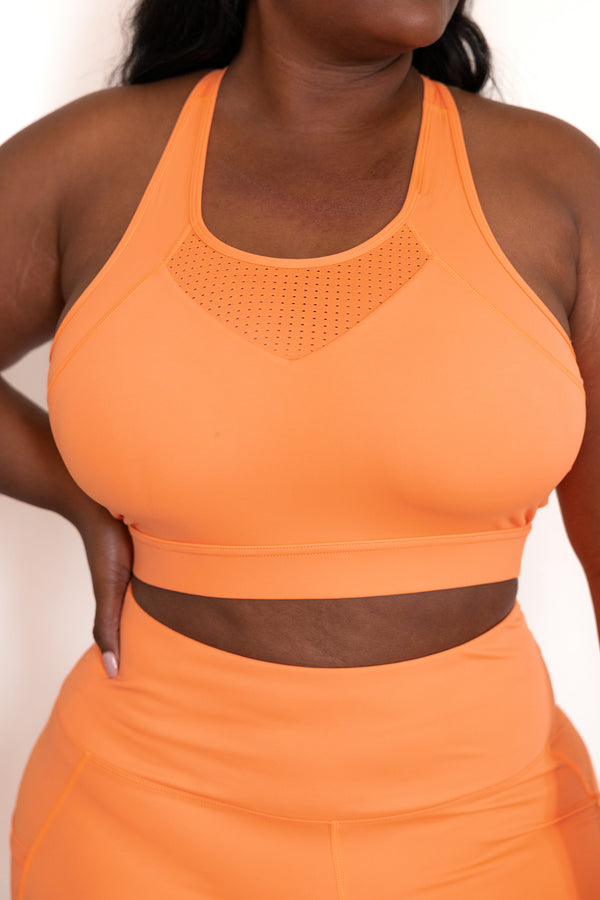 Chic Soul plus size clothing, coral orange sports bra with mesh detailing