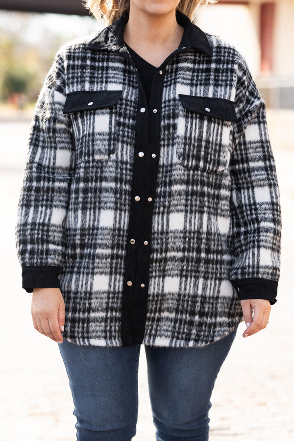 Plus Size black and white plaid shacket with a button-down front, collar, and chest pockets.