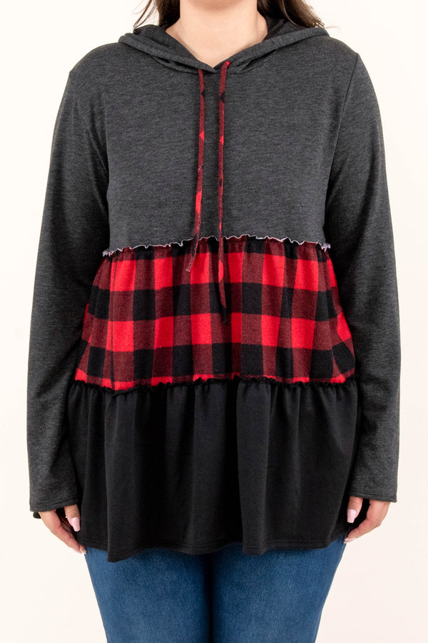 Chic Soul plus size clothing long sleeve top with a hoodie. The upper section of the shirt is in a dark gray color, the middle stripe is black and red plaid, and the lower portion is in a black color.